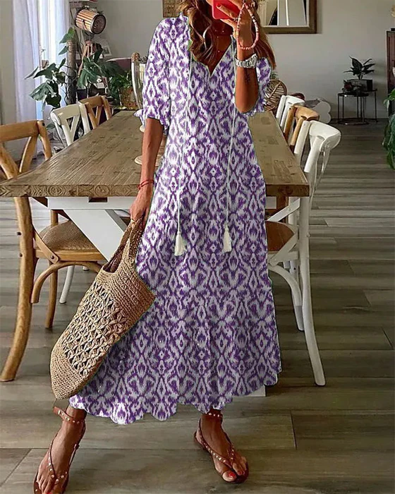 Printed long dress with V-neck and half sleeves